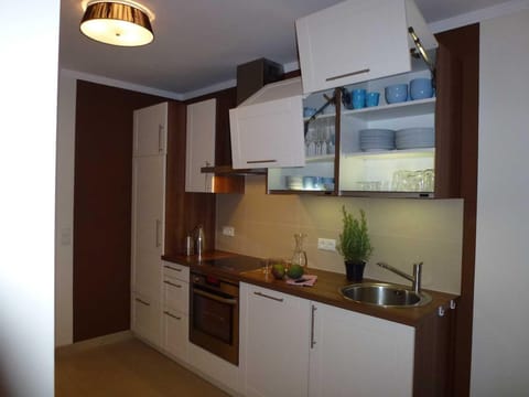 Fridge, oven, dishwasher, highchair