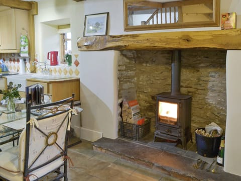 Warming wood burner | St Francis Cottage, Ulpha, near Broughton-in-Furness