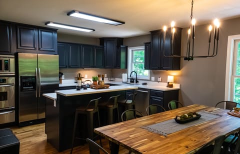 A Chef's Kitchen, Complete With A Three Chafing Dish Warming Drawer For Prep!