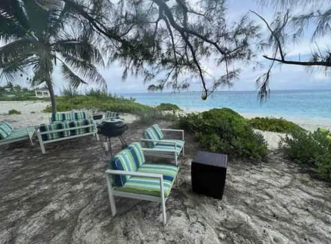 On the beach, sun loungers, beach towels