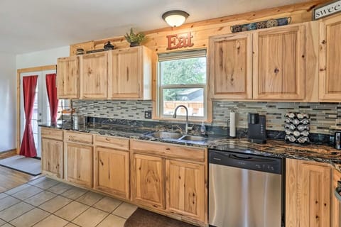 Rustic wood cabinets filled with all the comforts and amenities of home!