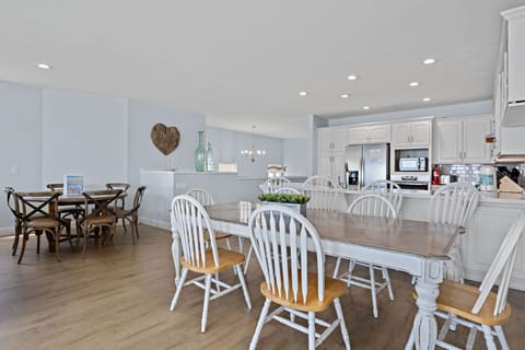 Gather around the large dining table for meals, games and quality time in this open, inviting space