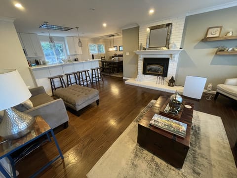Our open floor plan has a large living room + remodeled kitchen + dining room