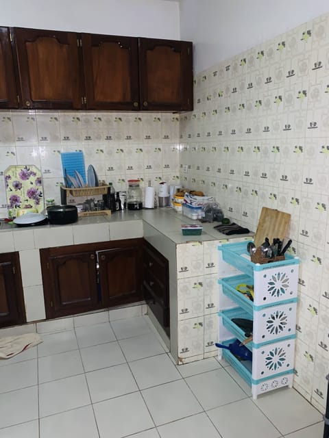 Fridge, oven, electric kettle, cookware/dishes/utensils