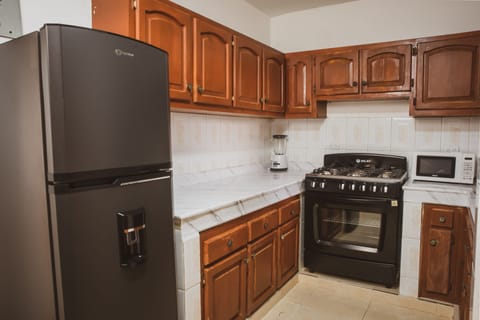 Fridge, microwave, dishwasher, coffee/tea maker