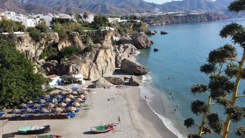 On the beach, sun loungers