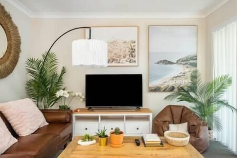 Living room: TV, TV table, Sofa, Coffee table
