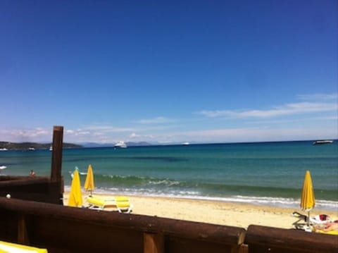 Beach nearby, sun loungers