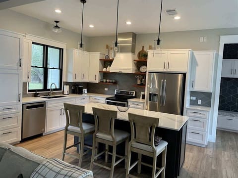 Open concept kitchen and dining area.