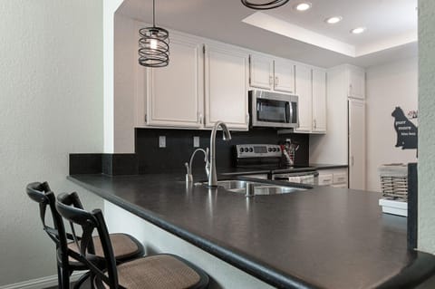 counter height sitting overlooking kitchen
