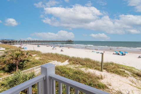 On the beach, sun loungers, beach towels