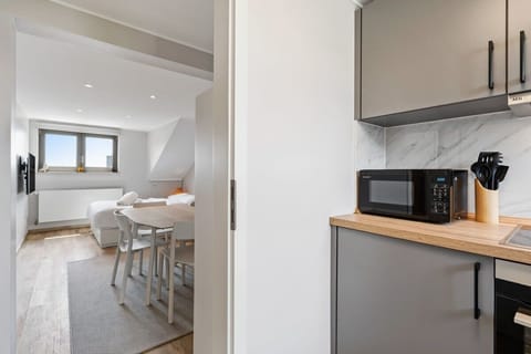 Fully stocked kitchenette ready for your culinary exploits, with a view to inspire. Direct bookings: www.arcaproperties.lu