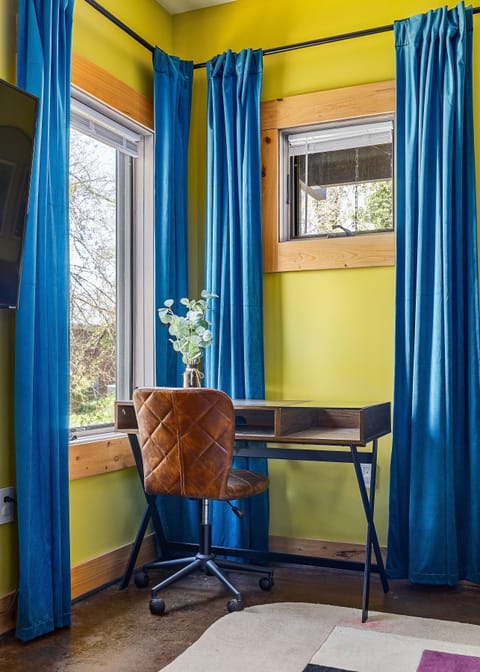 With natural lighting and cozy decor, this work station is perfect for productivity or relaxation.