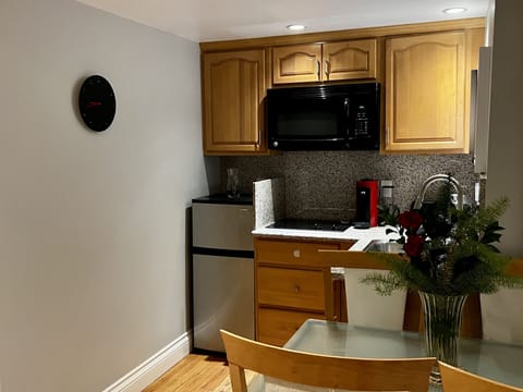 Mini fridge, Keurig coffee machine, 2 - burner stove, electric teakettle, etc