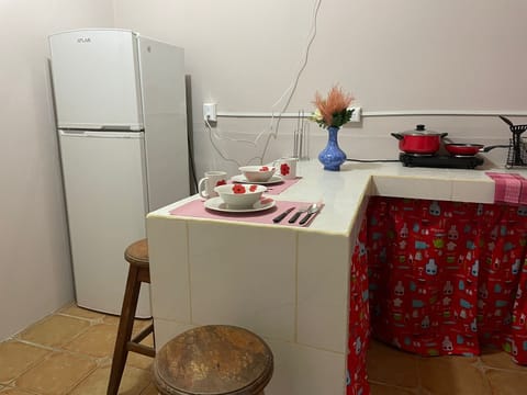 Fridge, coffee/tea maker, cookware/dishes/utensils, paper towels