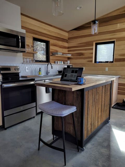 The kitchen island is also a great place to work, or just enjoy a cup of coffee.