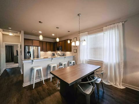Dining room table that can hold a whole mess of food and comfortably seats 6