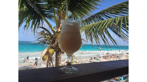 On the beach, sun loungers, beach towels