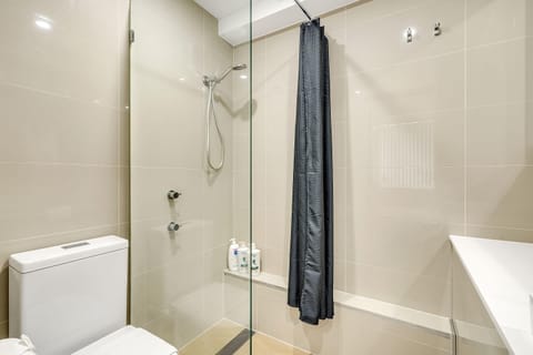 Shower, rainfall showerhead, towels
