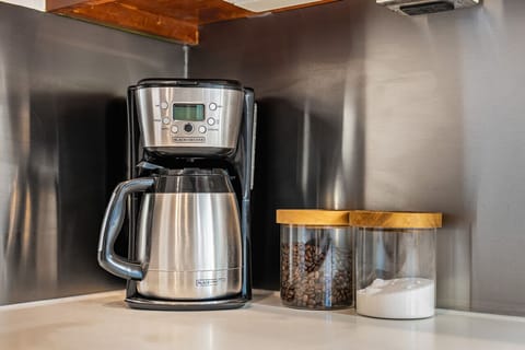 Coffee station with coffee, cream and sugar