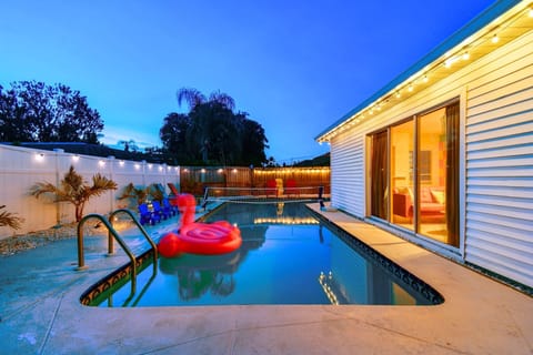 Outdoor pool, a heated pool, sun loungers