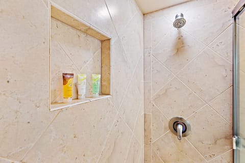 Combined shower/tub, hair dryer, towels, soap