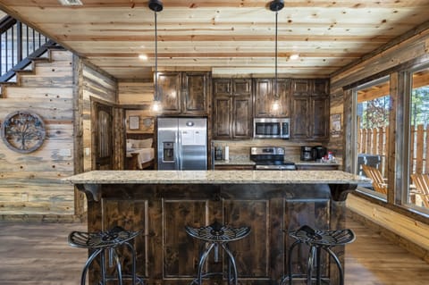 Welcome to your fully stocked kitchen, equipped with everything you need - from pots and pans to dishes and utensils. Your culinary adventures await!