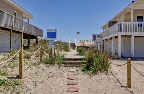 Easy paved access & within a 2 minute walk, your toes will be in the sand!