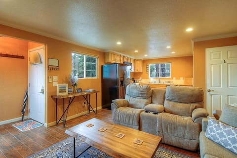 Kick your feet up on our couch with two recliners and watch some tv or play some games on the PS4.