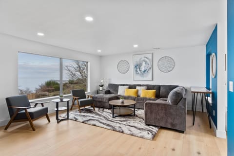 Enjoy hanging out in the living room and watching the ships go by