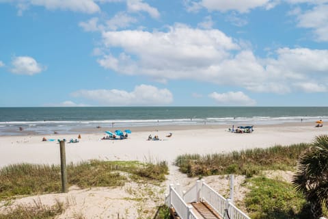 On the beach, sun loungers, beach towels