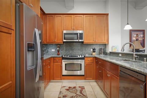 Modern Kitchen with Refrigerator, Microwave and Convection Oven/Range