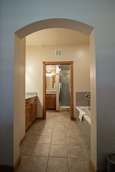 Bathtub, jetted tub, hair dryer, towels