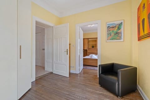 Charming corridor leading to well-appointed rooms, complete with artful decor.