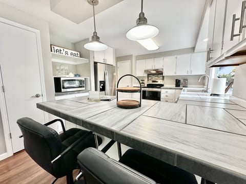 Breakfast bar connecting to the dining area.
