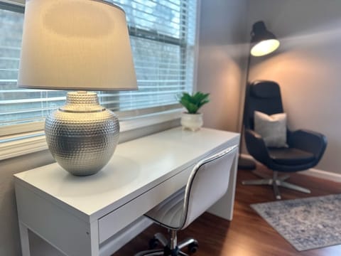 Dedicated workspace in living room.