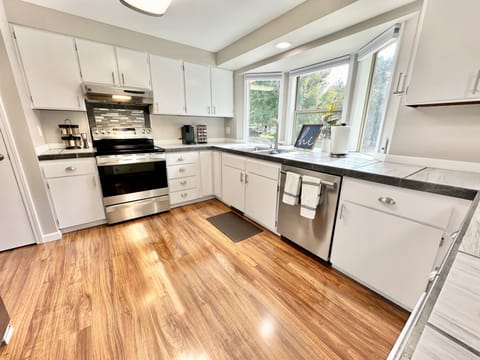 Large and fully equipped kitchen with loads of counter and cupboard space.  