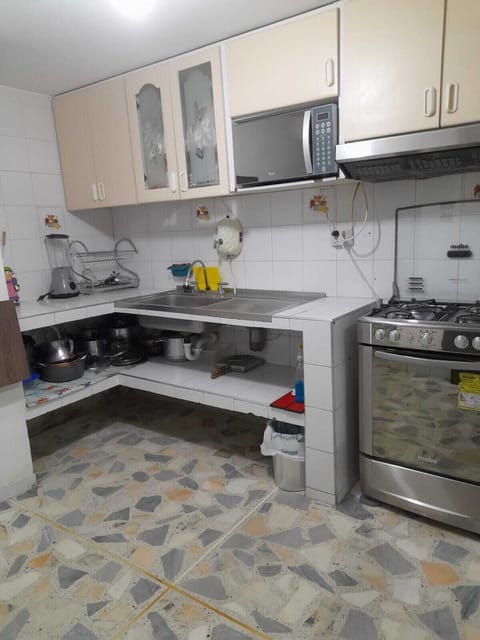 Fridge, microwave, oven, cookware/dishes/utensils