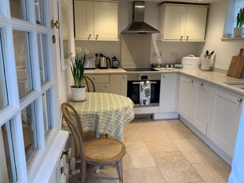 You enter the property through a stable door into the kitchen