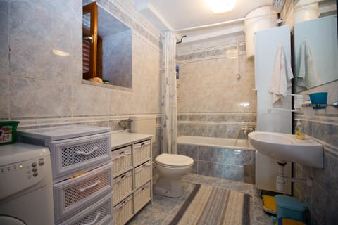 Combined shower/tub, hair dryer, towels, soap