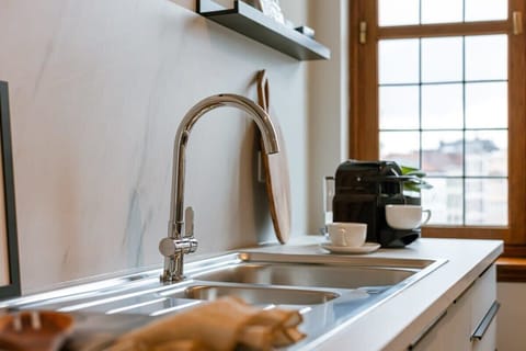 Enjoy a cup of Nespresso coffee