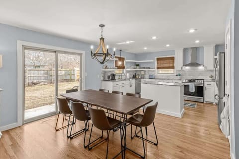 Stylish dining area: Eightâseat dining tableâgreat for shared meals & conversation.