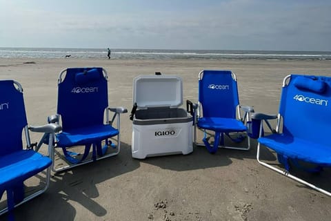 New 4Ocean beach chairs and igloo cooler provided.
