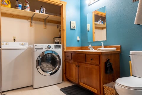 Combined shower/tub, hair dryer, towels, soap