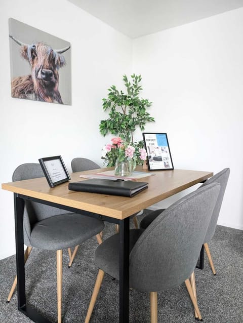 Dining area with table and chairs 