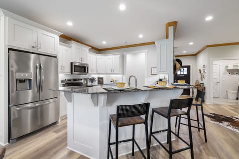 Open concept kitchen with bar seating