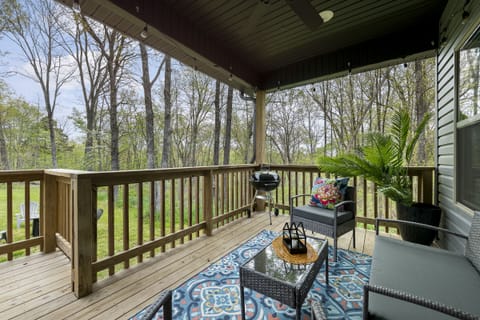 Enjoy our morning coffee on the back covered porch listing to nature