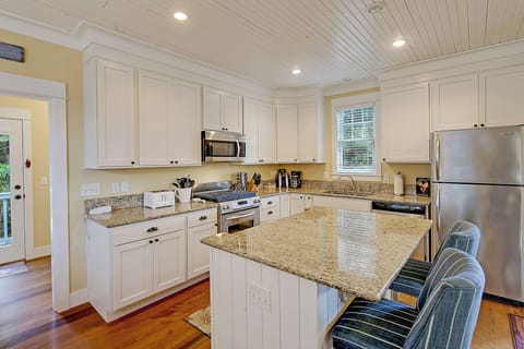 The fully equipped kitchen is ready for your culinary creations