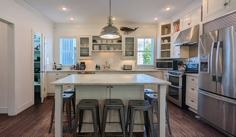 Sip your morning coffee around the island