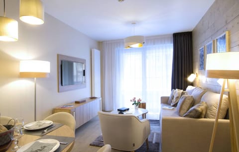 Kick back your feet and relax in the cozy living area.